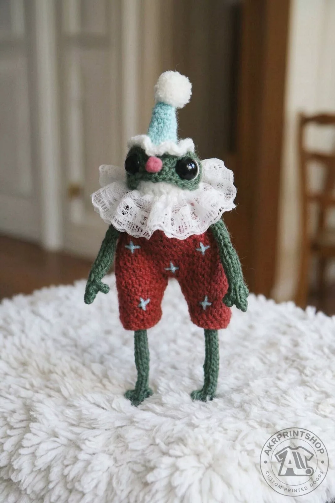 knitted crocheted frog doll